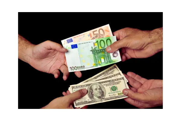 Ilustração mostrando conversão dinâmica para reais, que aumenta o custo da compra